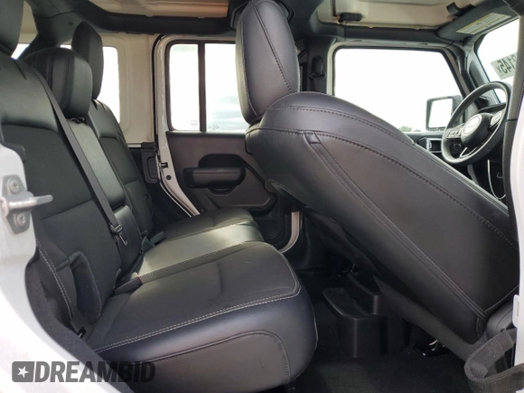 2023 Jeep Wrangler Sport S with VIN 1C4HJXDNXPW569699, listed as a Copart auction lot 52392145 with 32,972 mi miles and Salvage title. Bid and sale history available at DreamBid. Image 10.