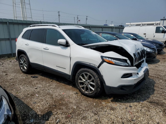 2017 Jeep Cherokee Latitude with VIN 1C4PJLCBXHW534318, listed as a Copart auction lot 59380155 with 101,051 mi miles and Salvage title. Bid and sale history available at DreamBid. Image 4.