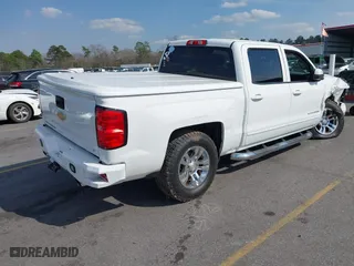 2015 Chevrolet Silverado 1500 LT with VIN 3GCUKREC9FG190338, listed as a IAAI auction lot 41793915 with 116,558 mi miles. Bid and sale history available at carsss.com. Image 4.