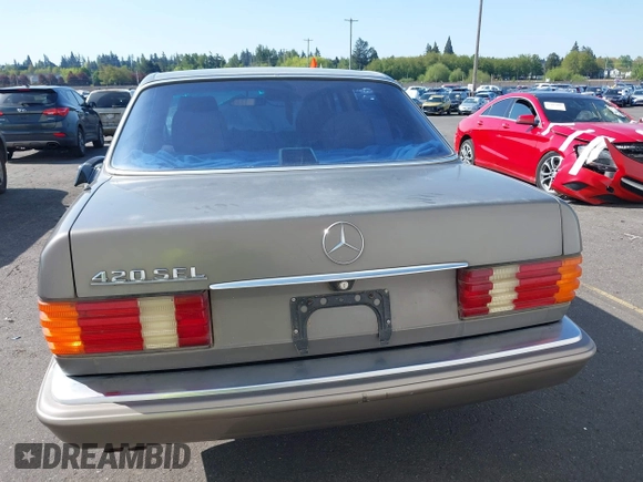 1986 Mercedes-Benz 420 Series 420SEL with VIN WDBCA35D9GA209179, listed as a IAAI auction lot 42081253 with 141,249 mi miles. Bid and sale history available at carsss.com. Image 16.