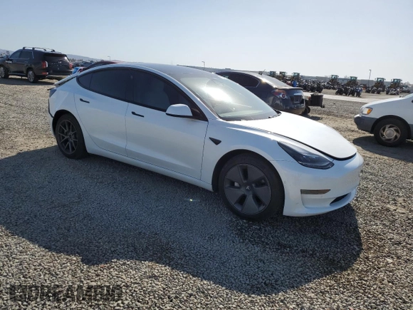 2021 Tesla Model 3 Standard Range Plus with VIN 5YJ3E1EA0MF072457, listed as a Copart auction lot 51666135 with 32,534 mi miles and Salvage Title. Bid and sale history available at carsss.com. Image 4.