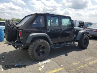 2015 Jeep Wrangler Unlimited Sport with VIN 1C4BJWDG1FL668395, listed as a Copart auction lot 64035035 with 79,972 mi miles and Salvage title. Bid and sale history available at DreamBid. Image 3.