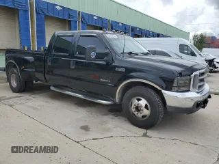 2001 Ford F-350 XL with VIN 1FTWW32F01EA68170, listed as a Copart auction lot 53516435 with 302,516 mi miles and Salvage title. Bid and sale history available at DreamBid. Image 4.