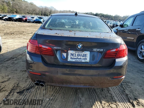 2016 BMW 5 Series 528i xDrive with VIN WBA5A7C54GG152400, listed as a Copart auction lot 80543343 with 74,579 mi miles and Salvage title. Bid and sale history available at DreamBid. Image 6.