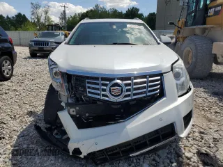 2016 Cadillac SRX Luxury Collection z VIN 3GYFNBE34GS505188, wystawiony jako Copart lot #56690805 z przebiegiem 121 935 mil mil oraz Czysty tytuł • Clean title. Historia ofert i sprzedaży dostępna na DreamBid. Obrazek 5.