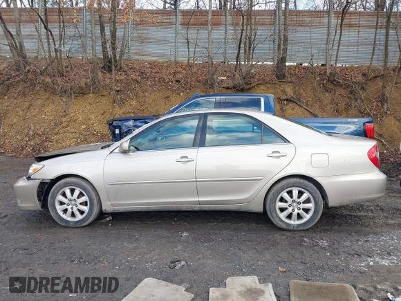 2003 Toyota Camry LE with VIN 4T1BE30K13U705105, listed as a IAAI auction lot 41696395 with 191,389 mi miles and . Bid and sale history available at DreamBid. Image 14.