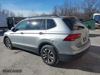 2024 Volkswagen Tiguan S with VIN 3VVFB7AX3RM045163, listed as a IAAI auction lot 41280613 with 7,705 mi miles. Bid and sale history available at carsss.com. Image 3.