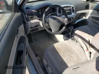 2007 Hyundai Accent SE z VIN KMHCN36CX7U048587, wystawiony jako Copart lot #59305325 z przebiegiem 85 492 mil mil oraz Szkoda całkowita • Salvage title. Historia ofert i sprzedaży dostępna na DreamBid. Obrazek 8.