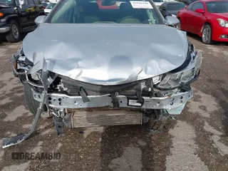 2018 Chevrolet Cruze LS with VIN 1G1BC5SM3J7237242, listed as a IAAI auction lot 41946298 with 65,725 mi miles and . Bid and sale history available at DreamBid. Image 13.