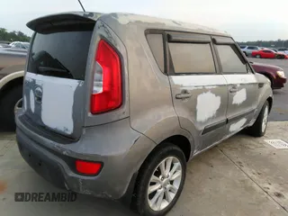 2013 Kia Soul + with VIN KNDJT2A67D7577423, listed as a IAAI auction lot 37425764 with 102,511 mi miles. Bid and sale history available at carsss.com. Image 4.