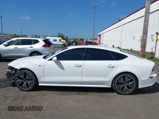 2016 Audi A7 Prestige with VIN WAU2GAFC1GN158272, listed as a IAAI auction lot 42012170 with 99,775 mi miles and . Bid and sale history available at DreamBid. Image 15.
