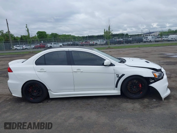 2013 Mitsubishi Lancer Evolution GSR z VIN JA32W8FV0DU023509, wystawiony jako IAAI lot #42222552 z przebiegiem 128 030 mil mil oraz . Historia ofert i sprzedaży dostępna na DreamBid. Obrazek 13.
