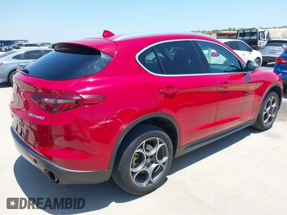 2018 Alfa Romeo Stelvio z VIN ZASFAKAN8J7B64173, wystawiony jako IAAI lot #42355202 z przebiegiem 111 698 mil mil oraz . Historia ofert i sprzedaży dostępna na DreamBid. Obrazek 4.