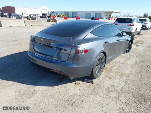 2022 Tesla Model S with VIN 5YJSA1E57NF467229, listed as a IAAI auction lot 41765897 with 1 mi miles. Bid and sale history available at carsss.com. Image 4.