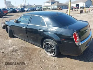 2014 Chrysler 300 C with VIN 2C3CCAKG5EH179583, listed as a IAAI auction lot 42001109 with 148,288 mi miles and . Bid and sale history available at carsss.com. Image 3.