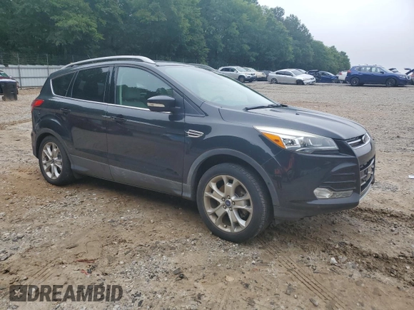2015 Ford Escape Titanium with VIN 1FMCU0J96FUC00683, listed as a Copart auction lot 58345105 with 61,031 mi miles and Salvage title. Bid and sale history available at DreamBid. Image 4.