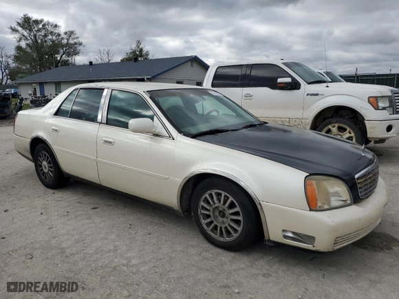 2003 Cadillac DeVille DHS with VIN 1G6KE57Y23U267952, listed as a Copart auction lot 80736904 with 216,825 mi miles and Clean Title. Bid and sale history available at carsss.com. Image 4.
