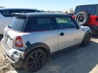 2013 MINI Cooper Hardtop S with VIN WMWSV3C50DT389419, listed as a IAAI auction lot 42027558 with 160,453 mi miles. Bid and sale history available at carsss.com. Image 4.