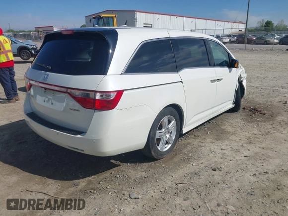 2013 Honda Odyssey Touring with VIN 5FNRL5H96DB009694, listed as a IAAI auction lot 42002487 with 182,867 mi miles and . Bid and sale history available at carsss.com. Image 4.