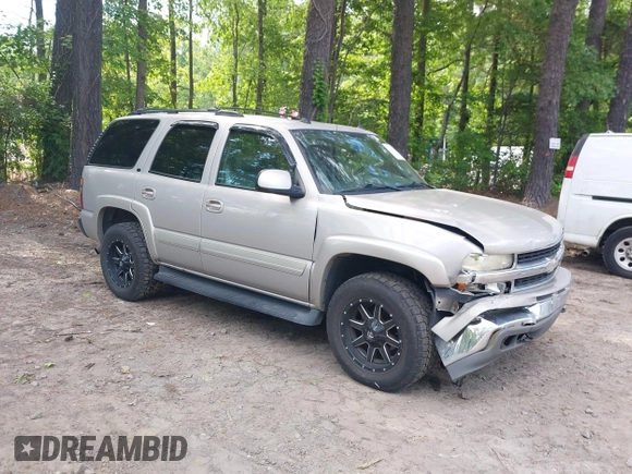 2005 Chevrolet Tahoe LS z VIN 1GNEK13T45J167997, wystawiony jako IAAI lot #42298160 z przebiegiem 142 981 mil mil oraz . Historia ofert i sprzedaży dostępna na DreamBid. Obrazek 1.