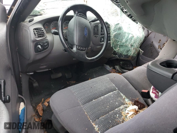 2003 Ford F-150 XL with VIN 1FTRF172X3NB77391, listed as a Copart auction lot 80657174 with Not Provided miles and Salvage Title. Bid and sale history available at DreamBid. Image 8.