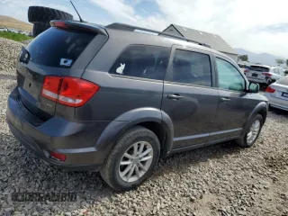 2015 Dodge Journey SXT with VIN 3C4PDDBG2FT684520, listed as a Copart auction lot 58835535 with 101,763 mi miles and Salvage title. Bid and sale history available at DreamBid. Image 3.