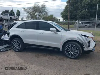 2024 Cadillac XT4 FWD Sport with VIN 1GYFZER48RF180481, listed as a IAAI auction lot 41093587 with 3,982 mi miles and . Bid and sale history available at DreamBid. Image 14.