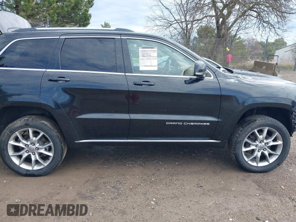 2015 Jeep Grand Cherokee Summit with VIN 1C4RJFJGXFC882787, listed as a IAAI auction lot 42098274 with 147,020 mi miles and . Bid and sale history available at DreamBid. Image 13.