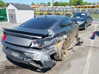 2021 Ford Mustang EcoBoost with VIN 1FA6P8TH3M5100601, listed as a IAAI auction lot 42060948 with 79,677 mi miles and . Bid and sale history available at DreamBid. Image 4.