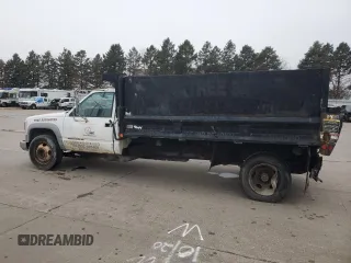 2001 GMC Sierra 1500 with VIN 3GDKC34GX1M100674, listed as a Copart auction lot 43498685 with 140,259 mi miles and Salvage Title. Bid and sale history available at DreamBid. Image 2.