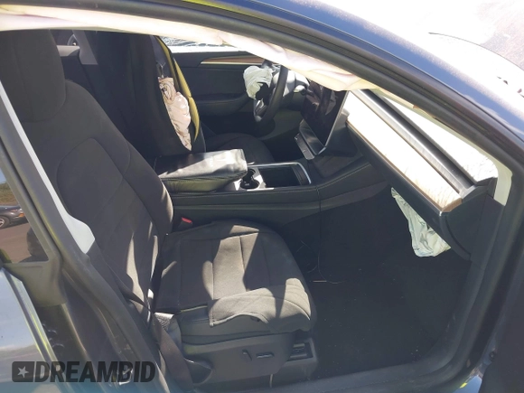 2023 Tesla Model Y Long Range z VIN 7SAYGAEE4PF945847, wystawiony jako IAAI lot #41071924 z przebiegiem 33 454 mil mil oraz . Historia ofert i sprzedaży dostępna na DreamBid. Obrazek 5.