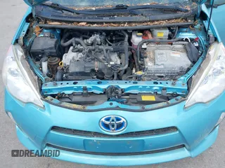 2014 Toyota Prius One with VIN JTDKDTB30E1077183, listed as a IAAI auction lot 42183675 with 92,560 mi miles and . Bid and sale history available at DreamBid. Image 10.
