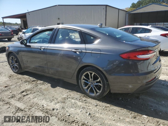 2020 Ford Fusion SEL z VIN 3FA6P0CD7LR196193, wystawiony jako Copart lot #53254465 z przebiegiem 79 944 mil mil oraz Szkoda całkowita • Salvage title. Historia ofert i sprzedaży dostępna na DreamBid. Obrazek 2.