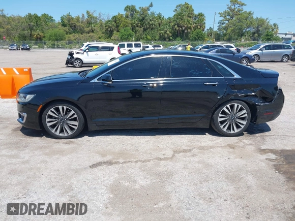 2018 Lincoln MKZ Reserve z VIN 3LN6L5E91JR602506, wystawiony jako IAAI lot #41976529 z przebiegiem 93 394 mil mil oraz . Historia ofert i sprzedaży dostępna na DreamBid. Obrazek 14.