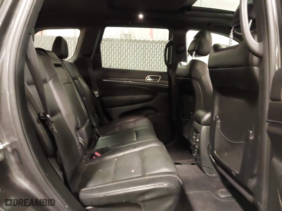 2016 Jeep Grand Cherokee Limited 75th Anniversary with VIN 1C4RJFBGXGC425705, listed as a IAAI auction lot 41779755 with 142,711 mi miles. Bid and sale history available at carsss.com. Image 8.