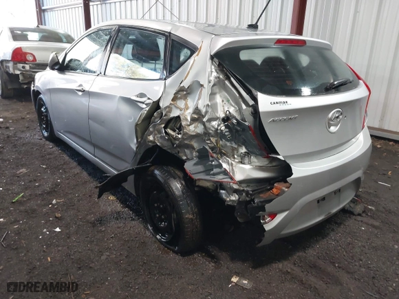 2013 Hyundai Accent GL with VIN KMHCT5AE7DU083867, listed as a IAAI auction lot 41390970 with 160,630 mi miles. Bid and sale history available at carsss.com. Image 3.