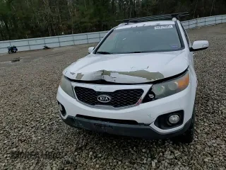 2011 Kia Sorento EX z VIN 5XYKU4A27BG136191, wystawiony jako Copart lot #52979995 z przebiegiem 209 280 mil mil oraz Szkoda całkowita • Salvage title. Historia ofert i sprzedaży dostępna na DreamBid. Obrazek 12.
