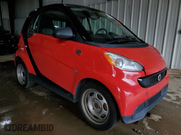 2015 Smart fortwo Passion with VIN WMEEJ3BA0FK797374, listed as a Copart auction lot 64472605 with 135,576 mi miles and Clean title. Bid and sale history available at DreamBid. Image 4.