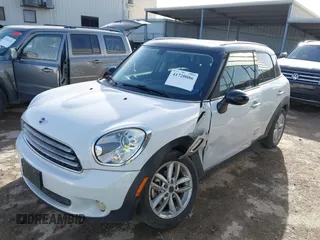 2012 MINI Countryman z VIN WMWZB3C53CWM02541, wystawiony jako IAAI lot #41720086 z przebiegiem 99 820 mil mil oraz . Historia ofert i sprzedaży dostępna na DreamBid. Obrazek 17.