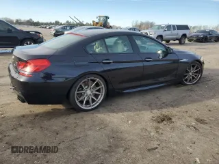 2014 BMW 6 Series 650i z VIN WBA6B2C51ED128896, wystawiony jako Copart lot #84801734 z przebiegiem 142 181 mil mil oraz Szkoda całkowita • Salvage title. Historia ofert i sprzedaży dostępna na DreamBid. Obrazek 3.