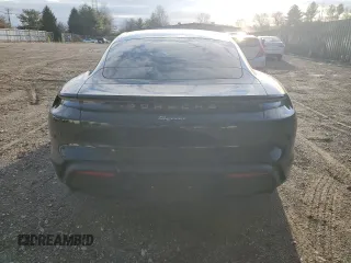 2023 Porsche Taycan z VIN WP0AA2Y12PSA16616, wystawiony jako Copart lot #82850004 z przebiegiem 20 893 mil mil oraz Szkoda całkowita • Salvage title. Historia ofert i sprzedaży dostępna na DreamBid. Obrazek 6.