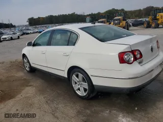 2009 Volkswagen Passat Sedan Komfort with VIN WVWJK73C59P025834, listed as a Copart auction lot 77911864 with 185,704 mi miles and Salvage Title. Bid and sale history available at carsss.com. Image 2.