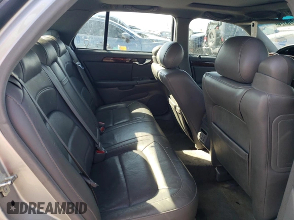 2004 Cadillac DeVille DTS z VIN 1G6KF57994U203706, wystawiony jako Copart lot #76278324 z przebiegiem 203 709 mil mil oraz Szkoda całkowita • Salvage title. Historia ofert i sprzedaży dostępna na DreamBid. Obrazek 10.