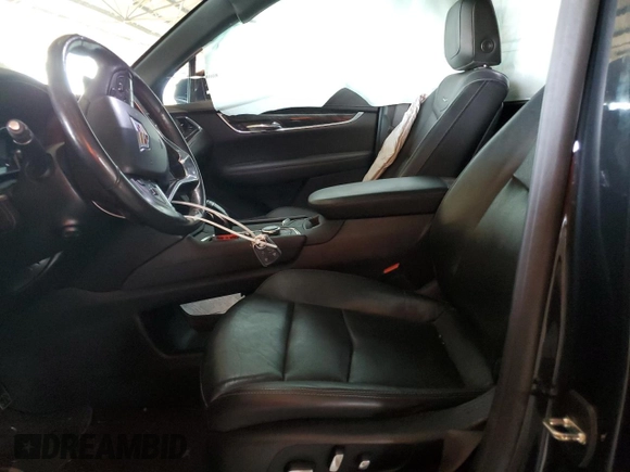 2020 Cadillac XT6 FWD Premium Luxury with VIN 1GYKPCRS8LZ149860, listed as a Copart auction lot 61108985 with 58,459 mi miles and Salvage title. Bid and sale history available at DreamBid. Image 7.