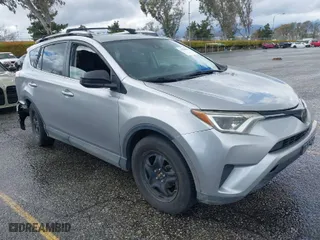 2017 Toyota RAV4 LE with VIN 2T3BFREV9HW659816, listed as a IAAI auction lot 41794815 with 197,751 mi miles. Bid and sale history available at carsss.com. Image 1.
