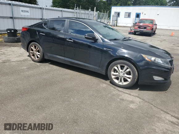 2013 Kia Optima LX z VIN 5XXGM4A79DG144608, wystawiony jako Copart lot #57461585 z przebiegiem 120 677 mil mil oraz Szkoda całkowita • Salvage title. Historia ofert i sprzedaży dostępna na DreamBid. Obrazek 4.