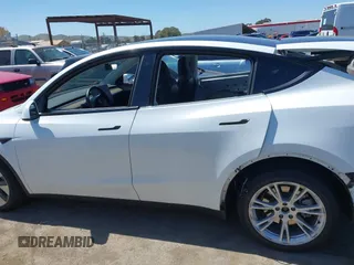 2023 Tesla Model Y Long Range with VIN 7SAYGDEE1PF660444, listed as a IAAI auction lot 42065046 with 23,601 mi miles and . Bid and sale history available at DreamBid. Image 15.