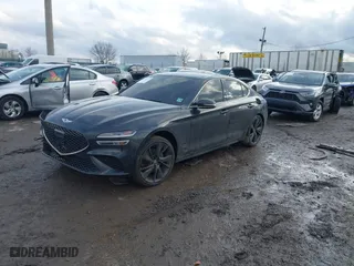2023 Genesis G70 2.0T with VIN KMTG34TA5PU120298, listed as a IAAI auction lot 41515747 with 32,724 mi miles. Bid and sale history available at carsss.com. Image 2.