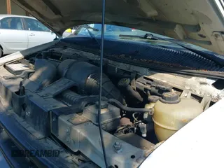 2000 Ford Econoline Cargo with VIN 1FTRE1421YHA04873, listed as a IAAI auction lot 43104196 with 193,720 mi miles and . Bid and sale history available at DreamBid. Image 12.