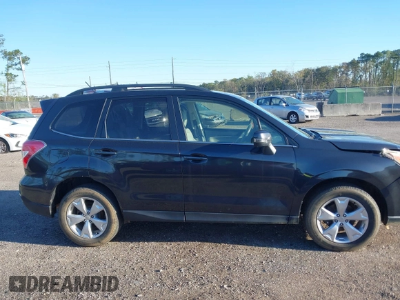 2014 Subaru Forester 2.5i Touring with VIN JF2SJAMC1EH452856, listed as a IAAI auction lot 41801406 with 148,342 mi miles. Bid and sale history available at carsss.com. Image 13.
